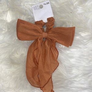 Hair scrunchie with bow